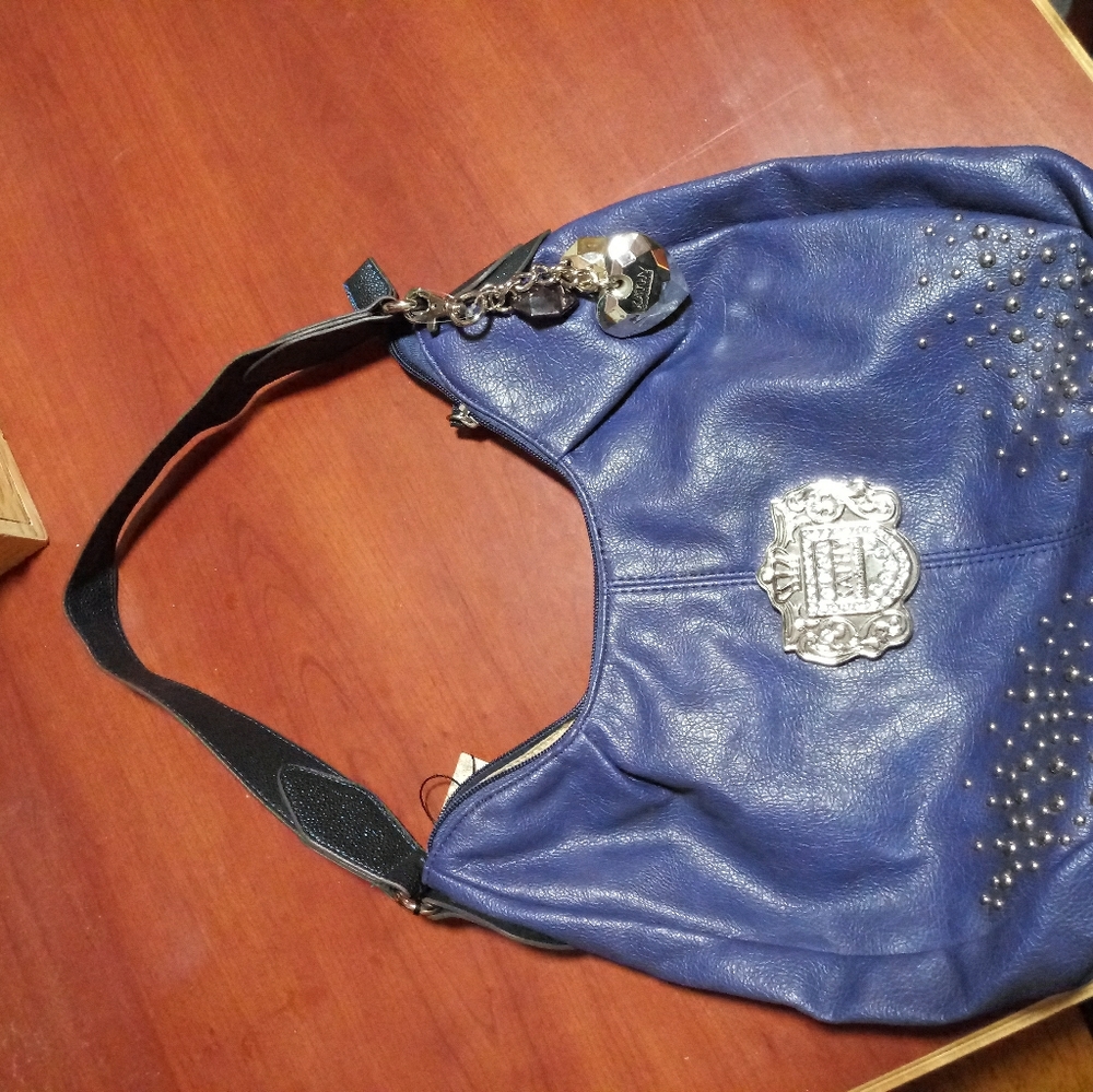 Kathy van zeeland purse originally 99$